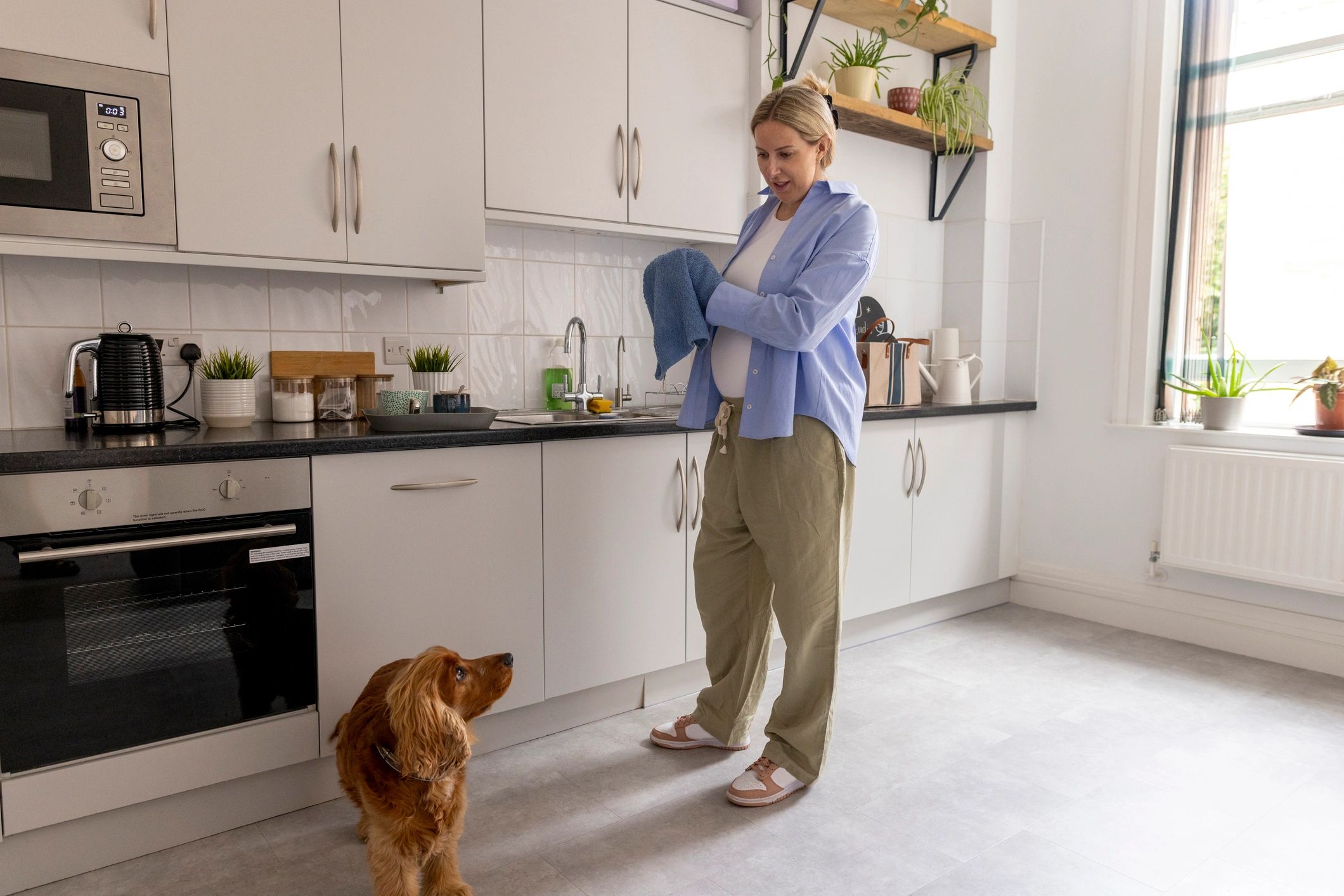 Professional cleaner working carefully in a modern office